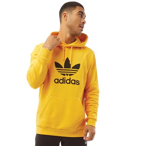 adidas hoodie heren geel|Adidas sweater heren.